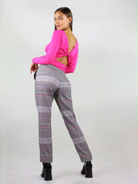 The revivify trousers have slim fit and straight leg, wraps nicely around the body. It has bright pink details and checker fabric in pink and grey.