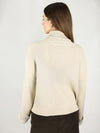 The beige turtle neck has comfortable fit as it is made from 100% organic cotton. Slightly loose fit and hips length. Extra long sleeves and long roll neck pullover. 