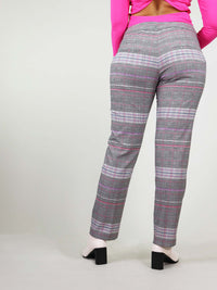 Checker fabric in grey and pink with slim fit. The revivify trousers have straight leg fit and are made ethically from up-cycled fabrics.