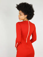 Tight body con and long sleeves, the wicked zipper dress comes in bright red and has a big white zip that goes from the neck to waist that can be unzipped.