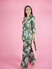 blonde gone rogue's girlboss pant suit in green with white floral print. The trouser suit is perfect for the office and formal occasions.