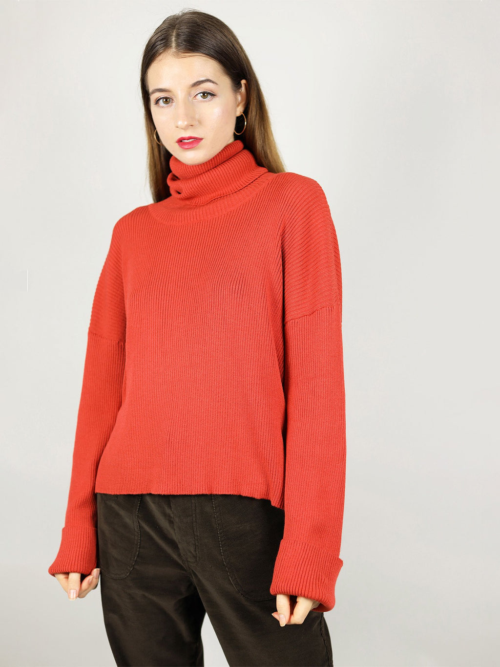 Made from 100% organic cotton, the red turteneck is very comfortable with loose fit. Some add ons include extra long roll neck pull over and long sleeves. 