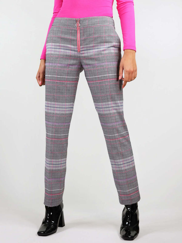 The revivify trousers have bright pink details and pink and grey checker fabric. They have two slant pockets and pink metal zip with ring puller at the front.