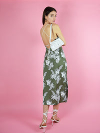 Backshot of blonde gone rogue's midi slip dress with open back. The shoulder straps are adjustable for a perfect fit.