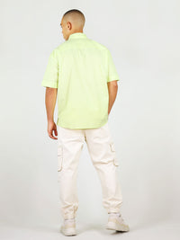 Back of light green menswear shirt with short sleeves by blonde gone rogue