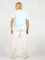 Back of light blue organic cotton t-shirt for men by blonde gone rogue