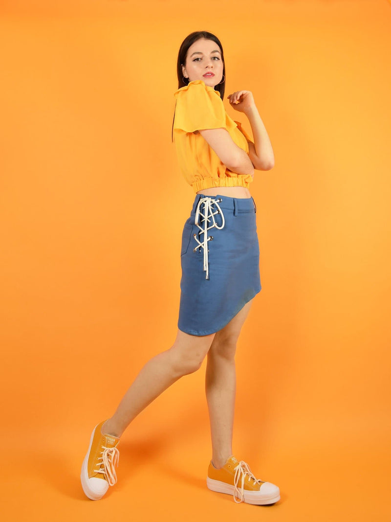 The lace up sustainable skirt by blonde gone rogue has a cool asymmetric design and closing with lace for optimal comfort. 