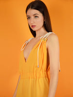 close-up of the sustainable summer jumpsuit - it has adjustable shoulder straps for a perfect fit