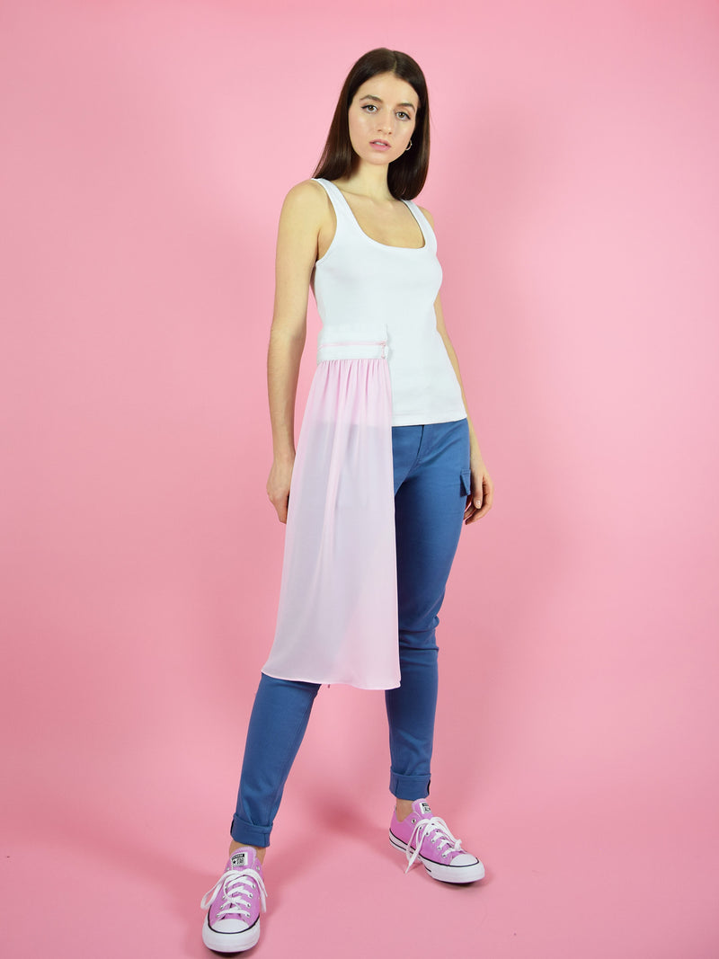 blonde gone rogue's summer breeze jersey tank top with pink veil. The top comes in white and the veil is detachable - giving the top a cool detail. It is paired with the wildflower skinny jeans.